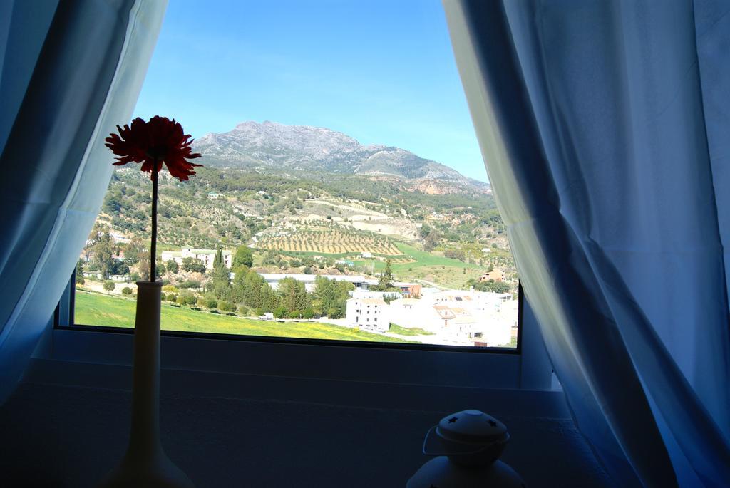 Hostal Sango Sierra De Las Nieves Alozaina Kültér fotó